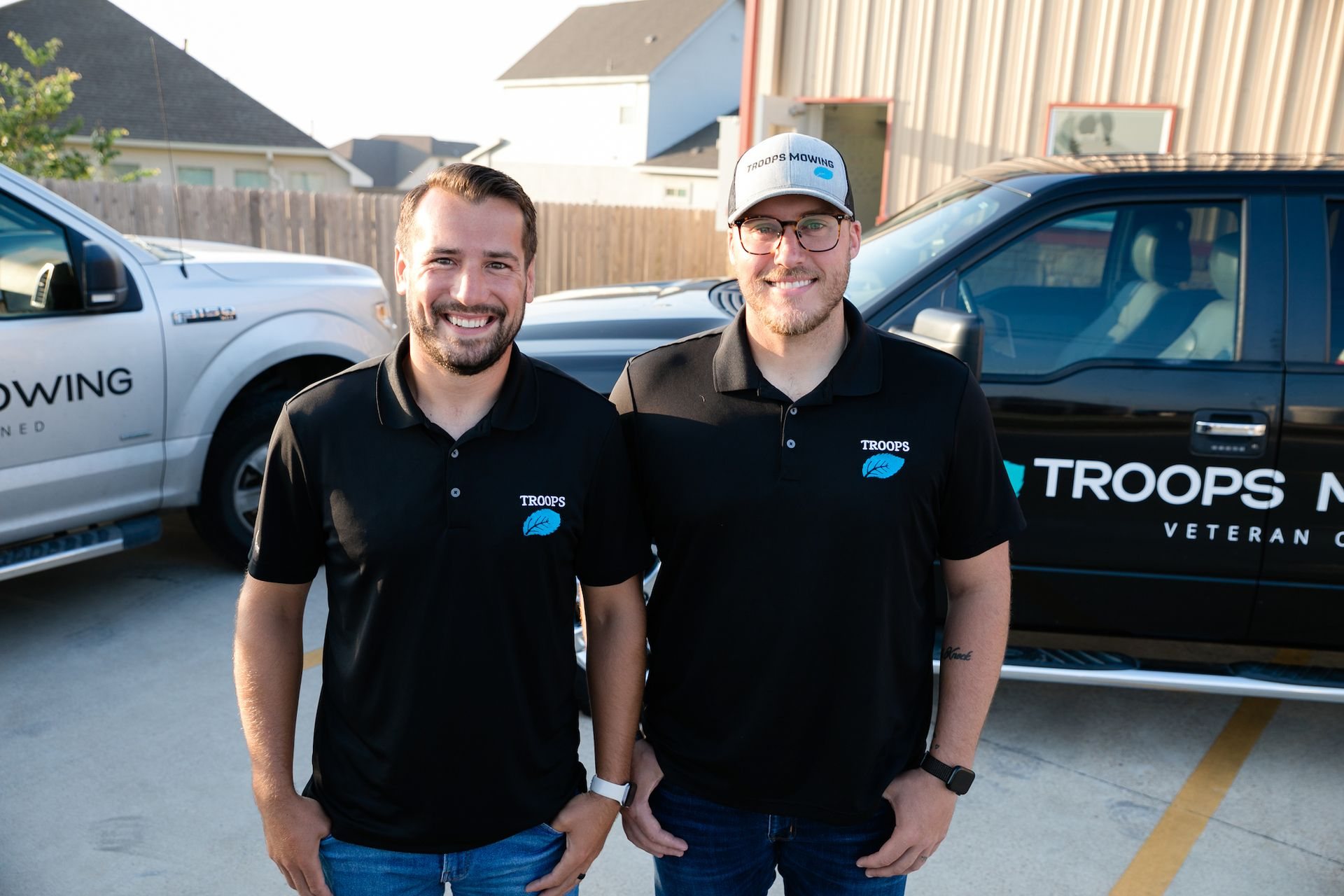 Sam and Dylan, the owners of Troops Mowing