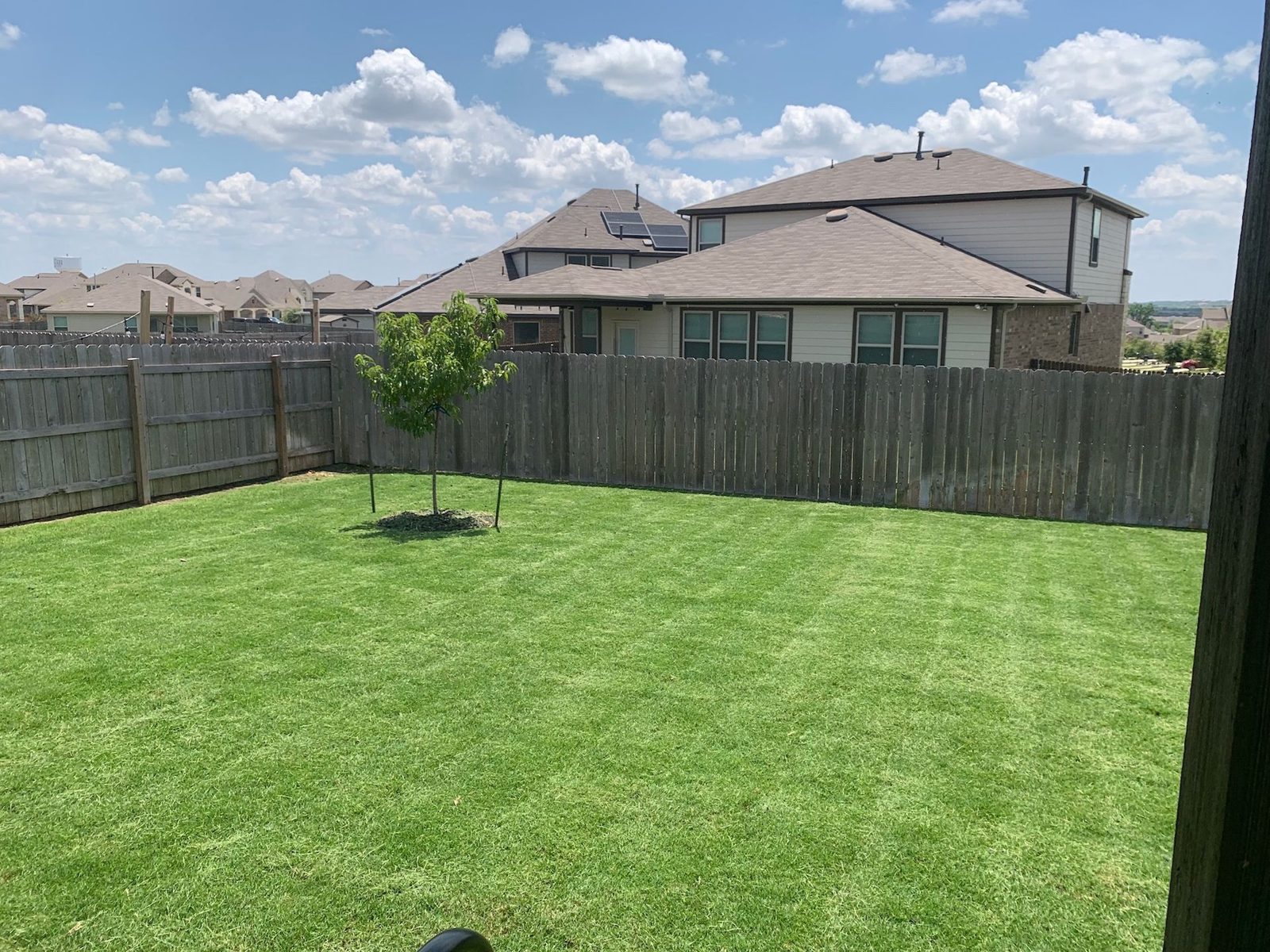 Troops Mowing customer yard
